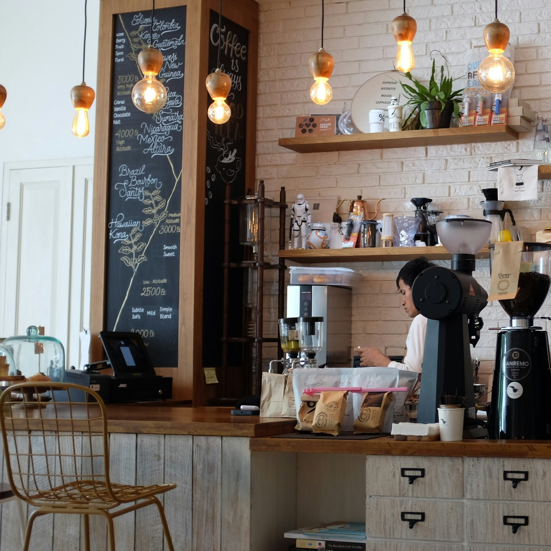 Employee working inside coffee shop