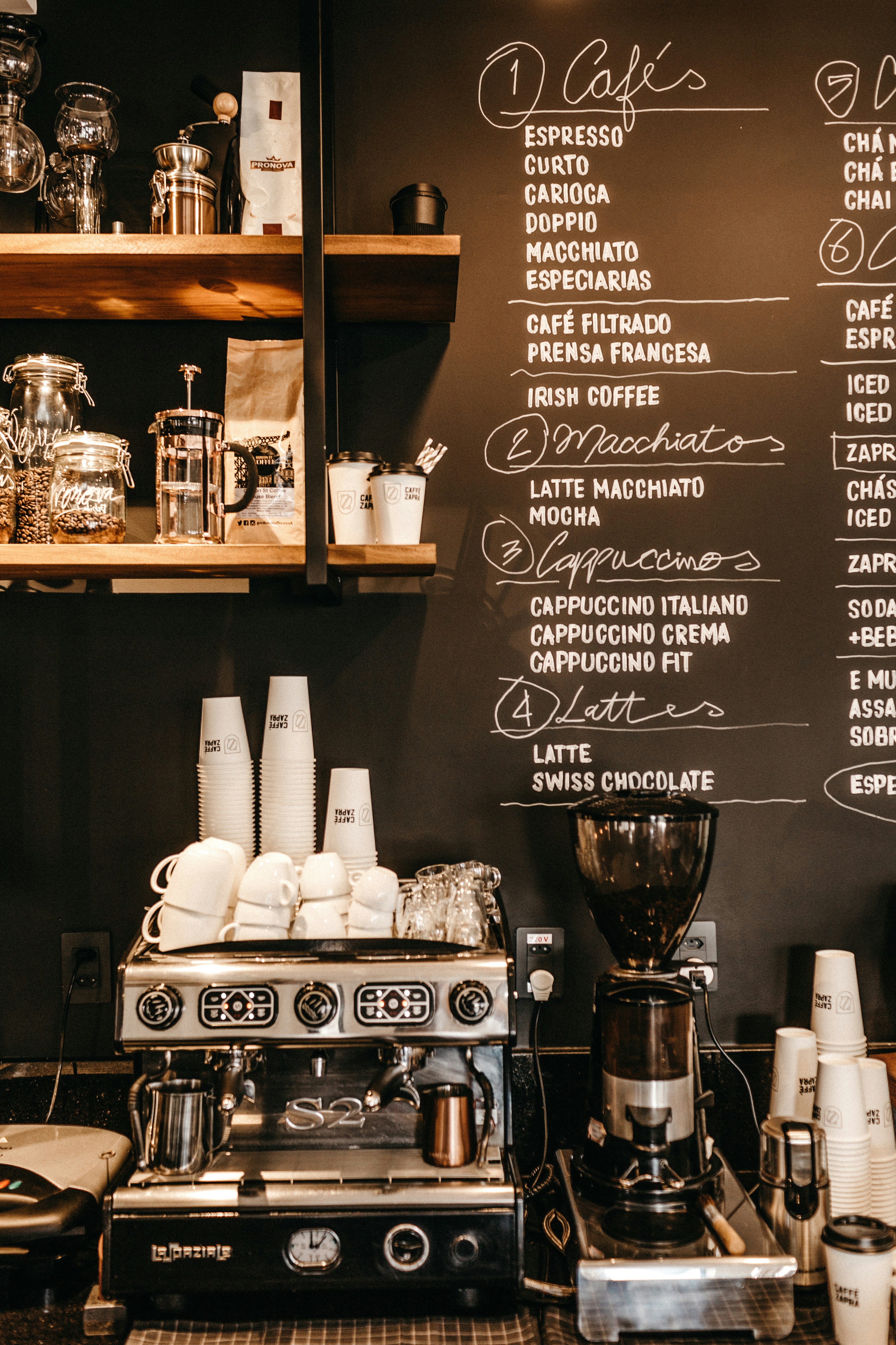 Menu displayed on a coffee shop wall